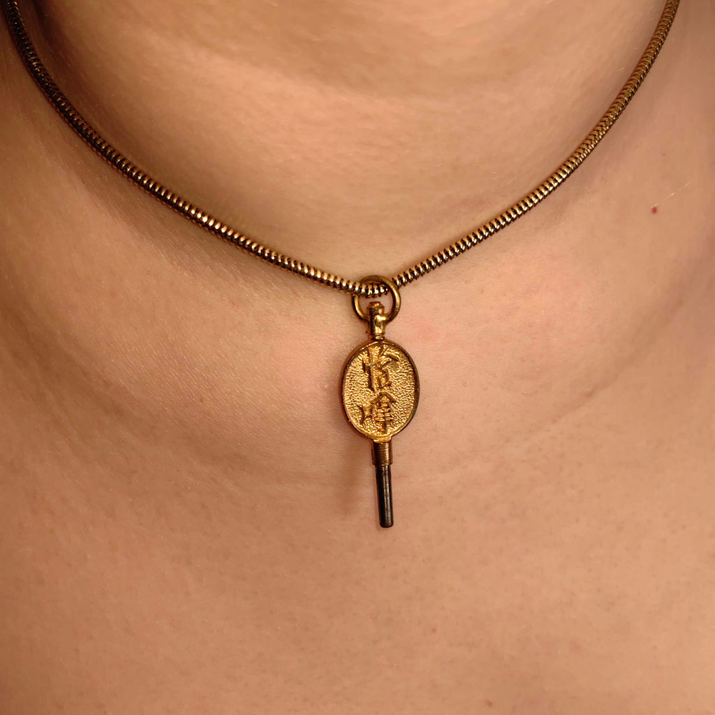 Antique Ormolu Gold Plated Watch Key Pendant: 19th Century Oriental Design