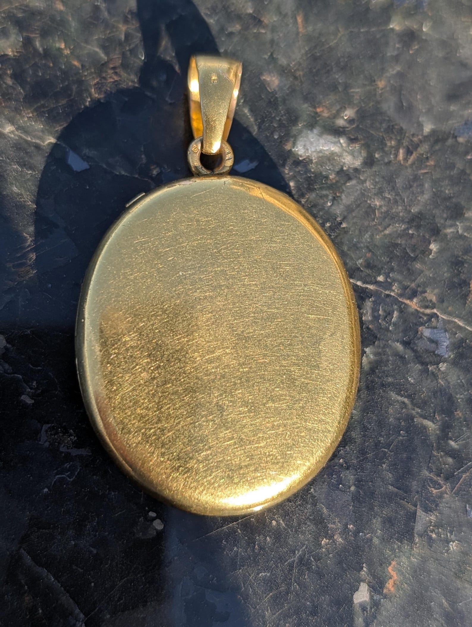 Back of antique 18k gold locket
