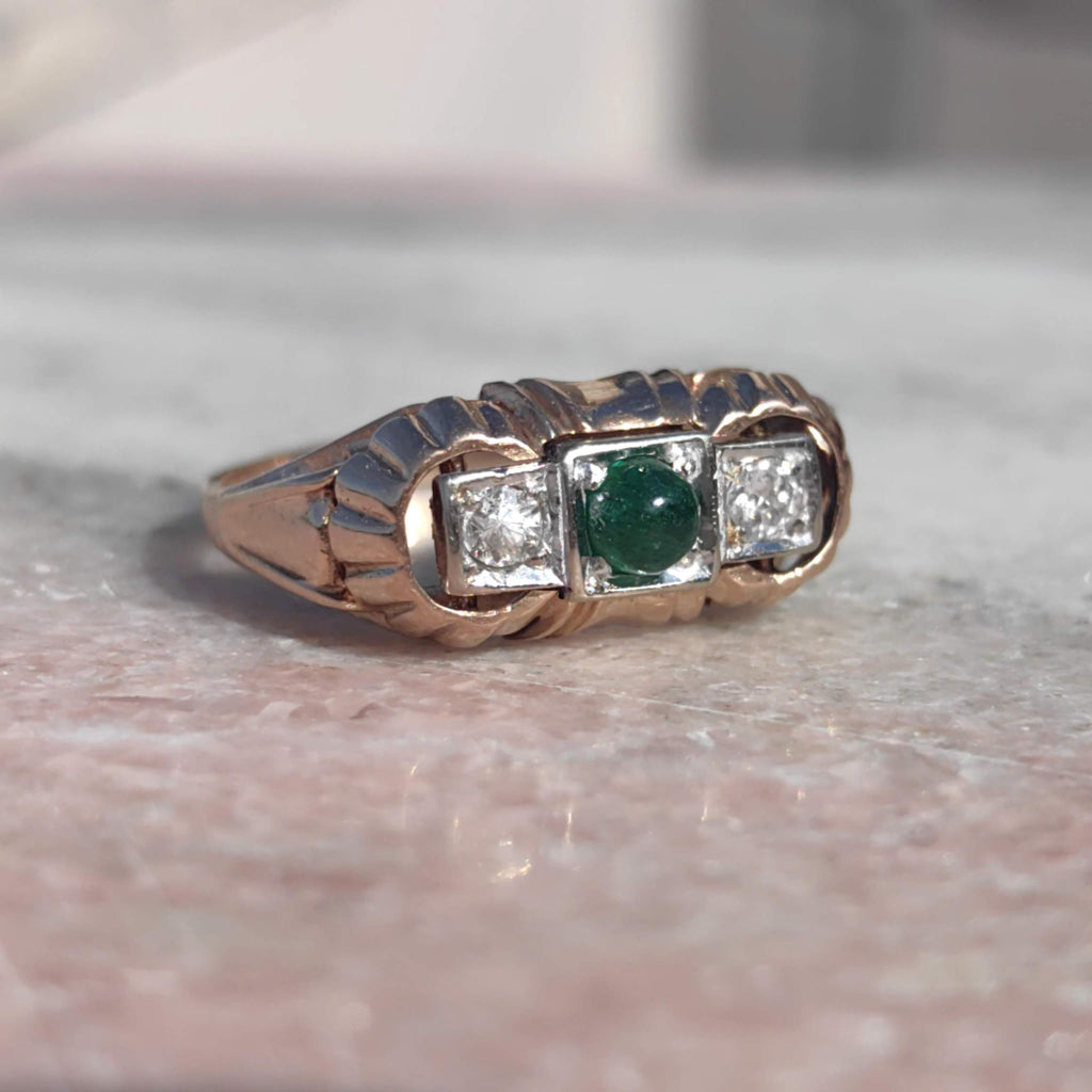 1930s Art Deco natural emerald and Old European cut diamond three-stone ring in solid 14k yellow rose gold